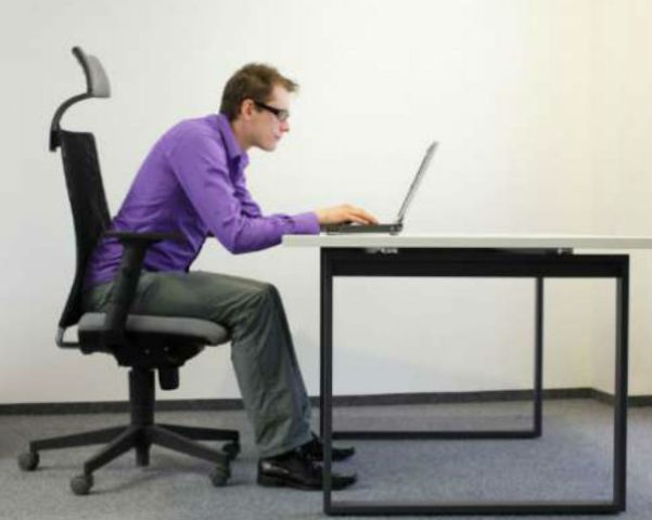 sitting_at_computer_desk-_shutterstock