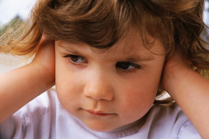 Little Girl Covering Ears