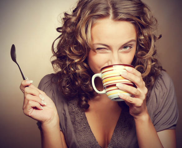 wavy-hair-woman-drinking-coffee