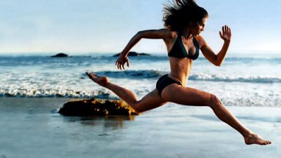 GIrl Running On Beach