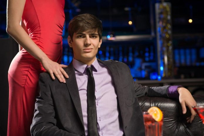 portrait-of-a-successful-man-in-a-nightclub