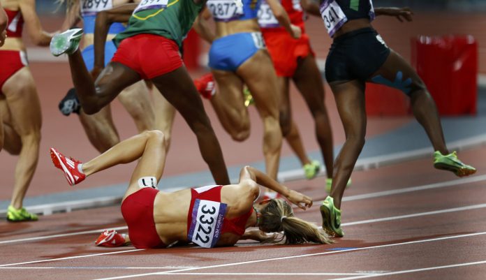 Morgan Uceny of the U.S. falls during the women's 1500m final during the London 2012 Olympic Games at the Olympic Stadium