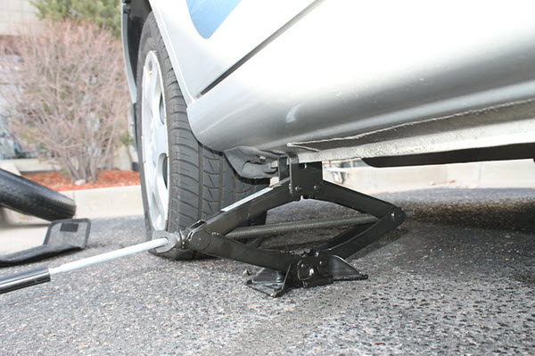 changing flat tire basic car repair