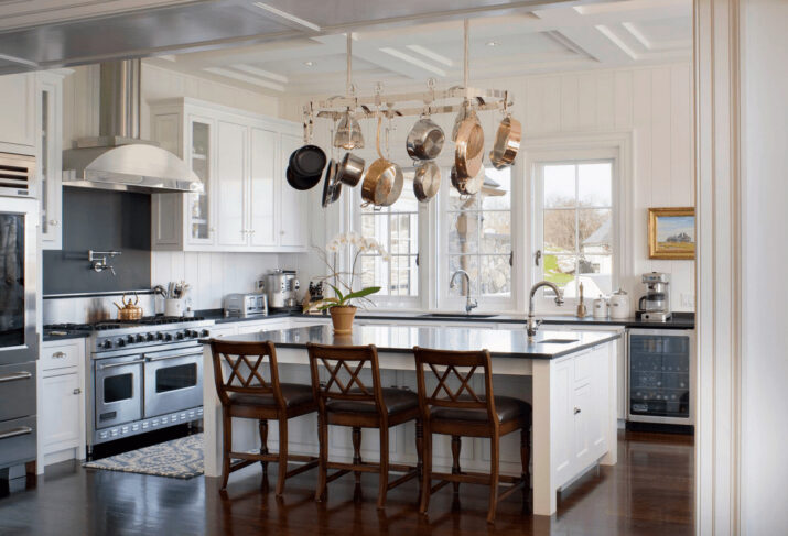 Hang Pans From the Ceiling Instead of Placing them on the Kitchen Shelves