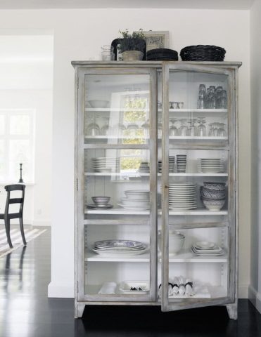 Get glass cupboards to showcase beautiful pots, and dishes