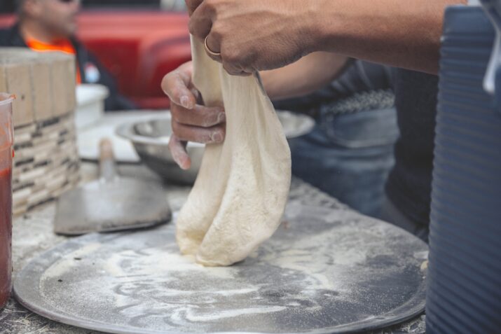 how to spin pizza dough