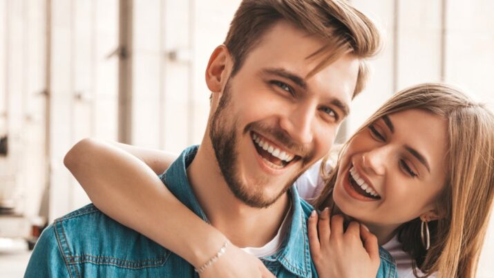 smiling men face with his women partner