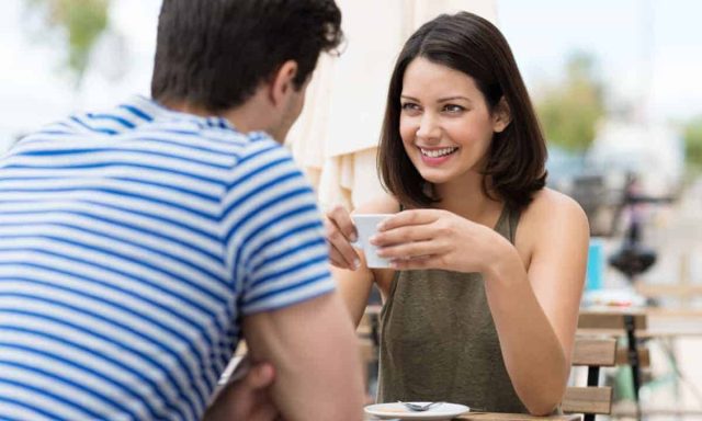 handsome couple taking on tea