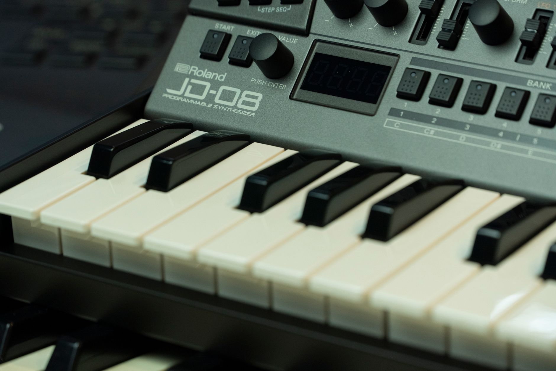 Detailed image of Roland JD-08 synthesizer keys, perfect for music production themes.